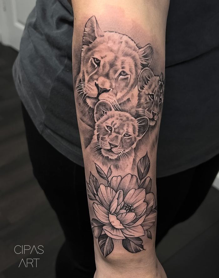 Lioness and cubs with peony